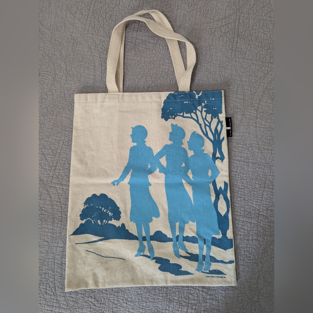 Out of Print Cream Tote with Blue Silhouette